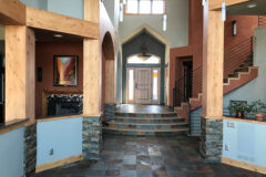 Floor: 12′′ × 12′′ Slate tile. Column Foundations: Ledger slate tile (stacked stone). Stair Risers: Custom-cut slate tile in Westminster, Colorado