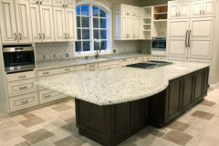 Kitchen Floor: Travertine tile, Versailles pattern. Kitchen Backsplash: 8′′ × 8′′ Mosaic tile in Cherry Hills, Colorado